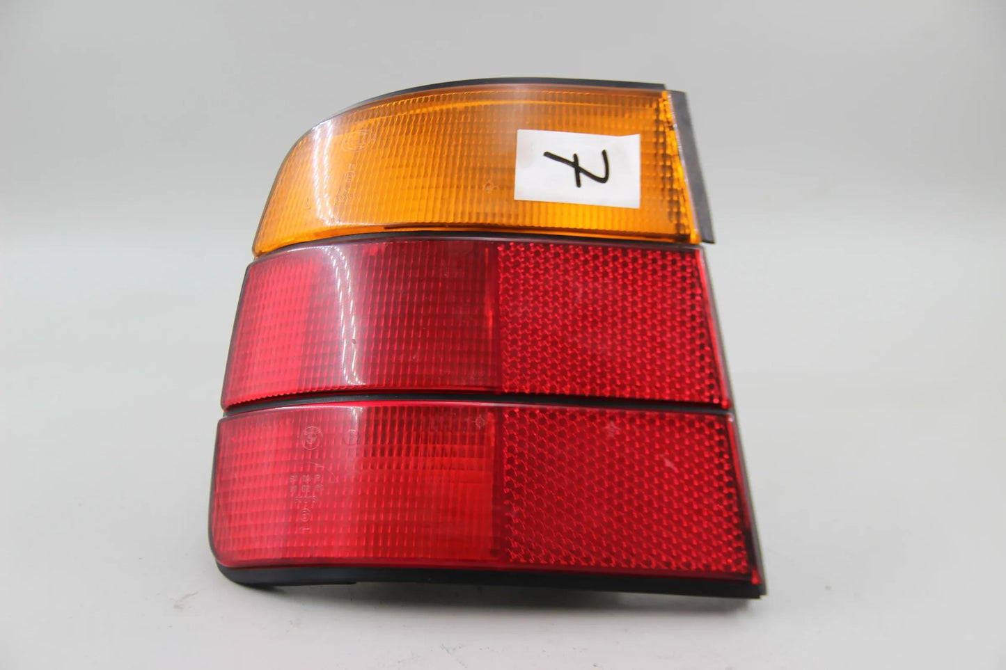 Original BMW E34 518i-540i M5 Heckleuchte Seitenwand links 63211384009