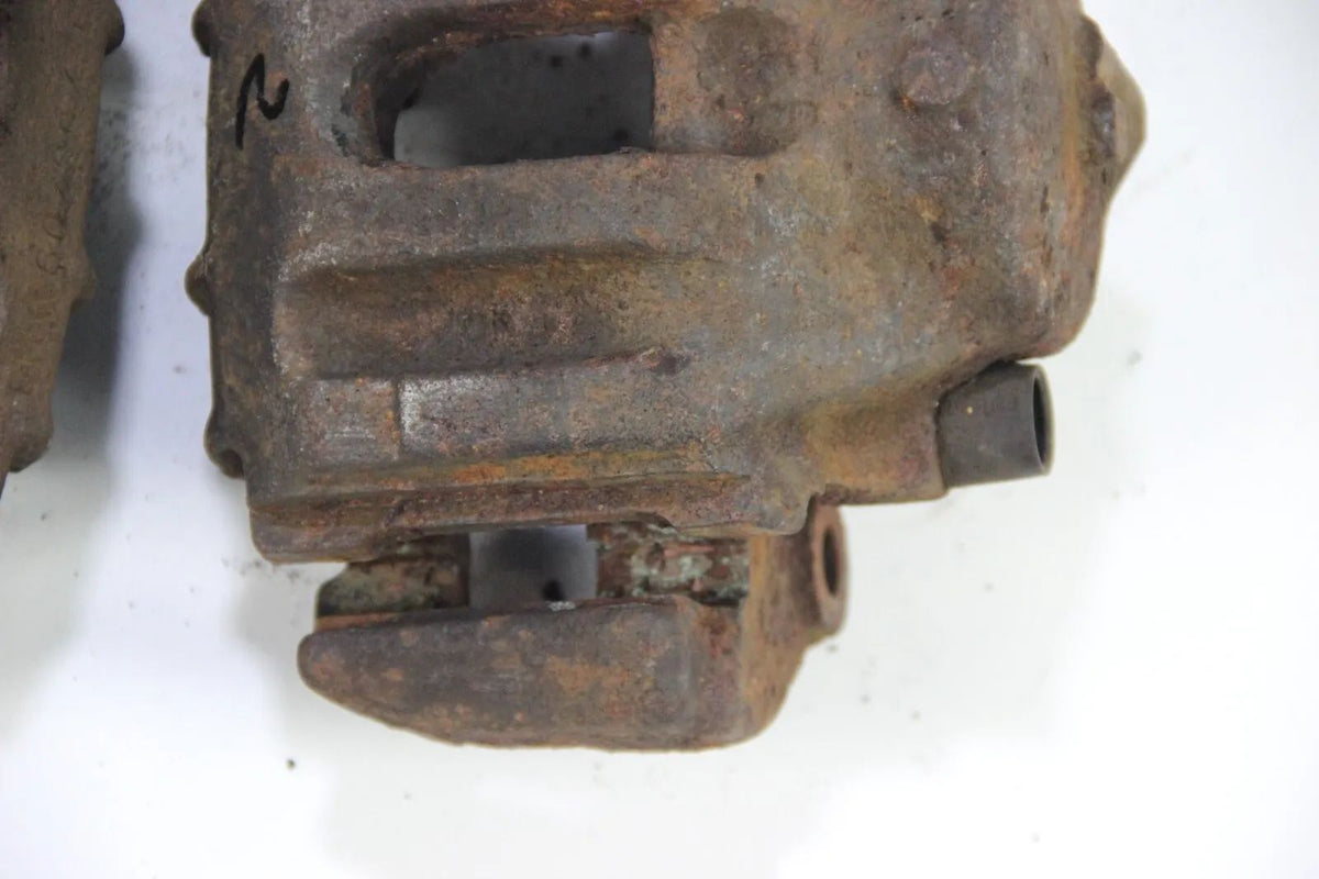 Original BMW E34 E32 Bremssattel vorne Links Rechts mit Träger Halter 60/22/302