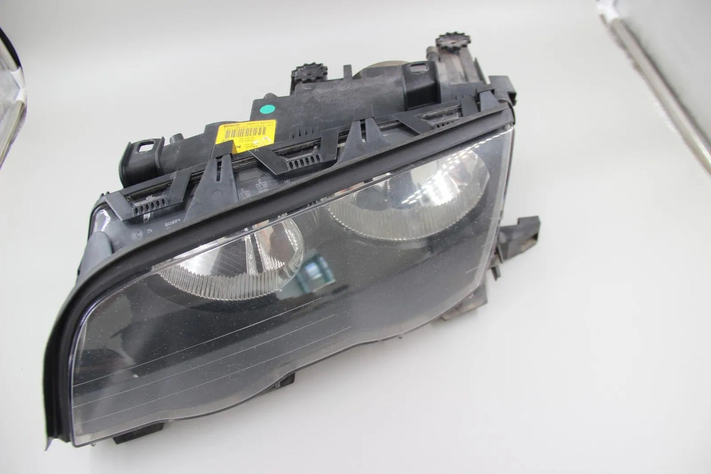 Original BMW E46 Limo/Touring  Scheinwerfer links Blende schwarz Bosch 631269027