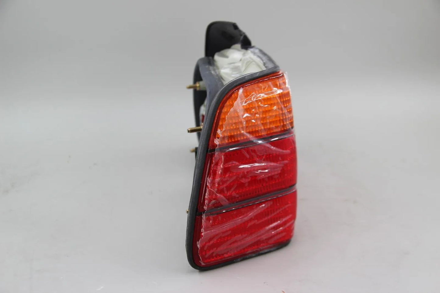 Original BMW E36 316i-323i Heckleuchte mit Nebelschlusslicht links 63211387657