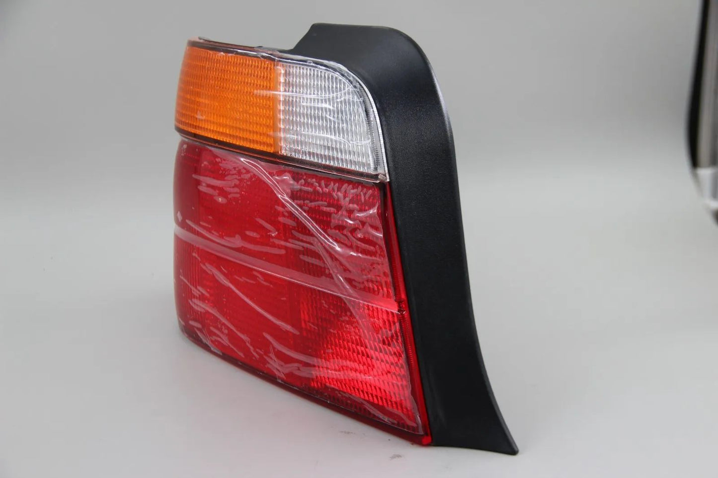 Original BMW E36 Compact 3er Heckleuchte mit Nebelschlusslicht links 63218357869