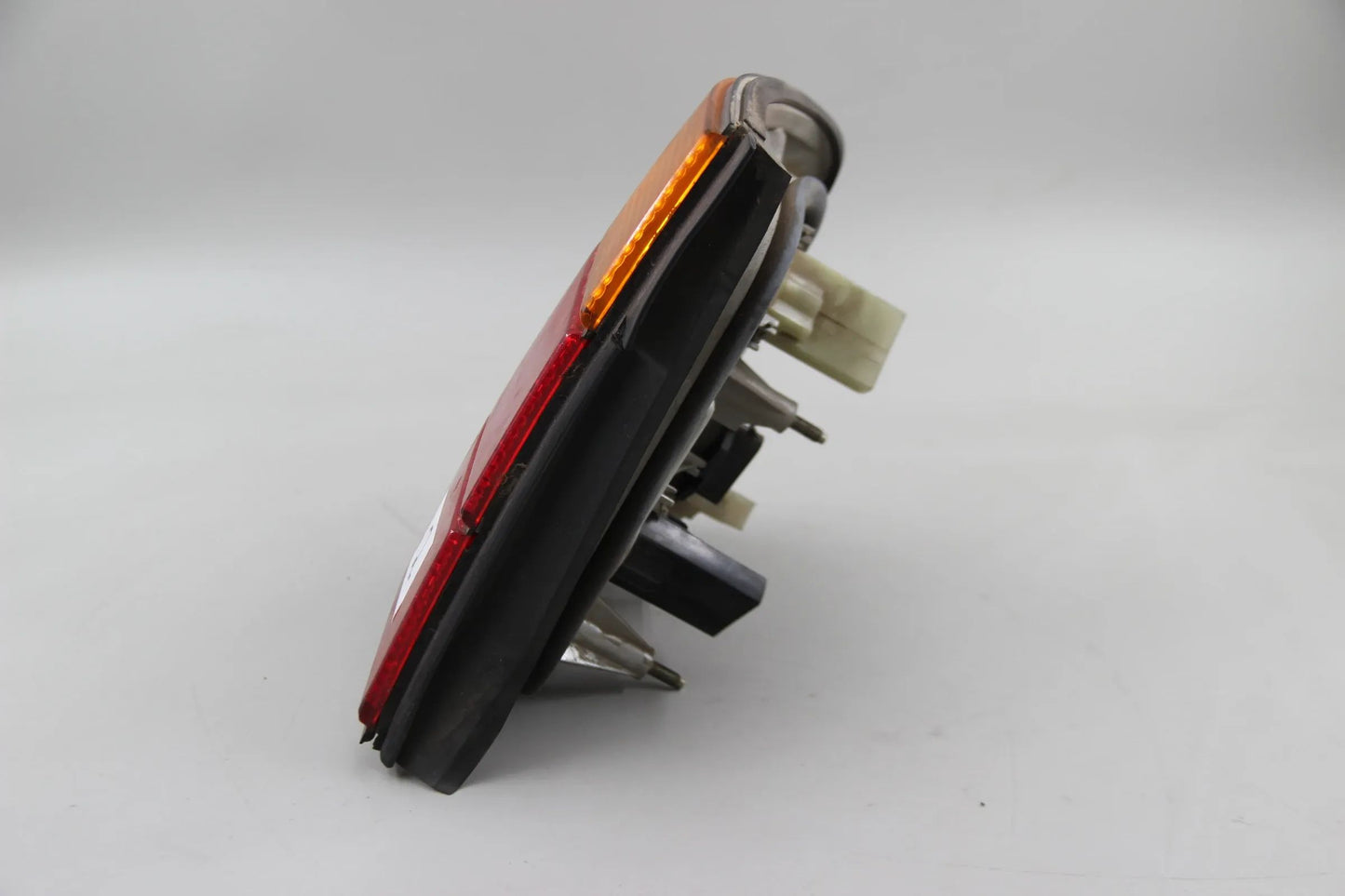 Original BMW E39 E34 Heckleuchte außen links 133689