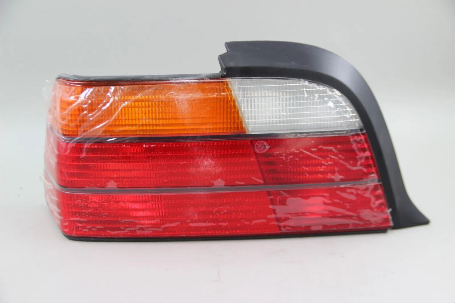 Original BMW E36 316i-323i Heckleuchte mit Nebelschlusslicht links 63211387657