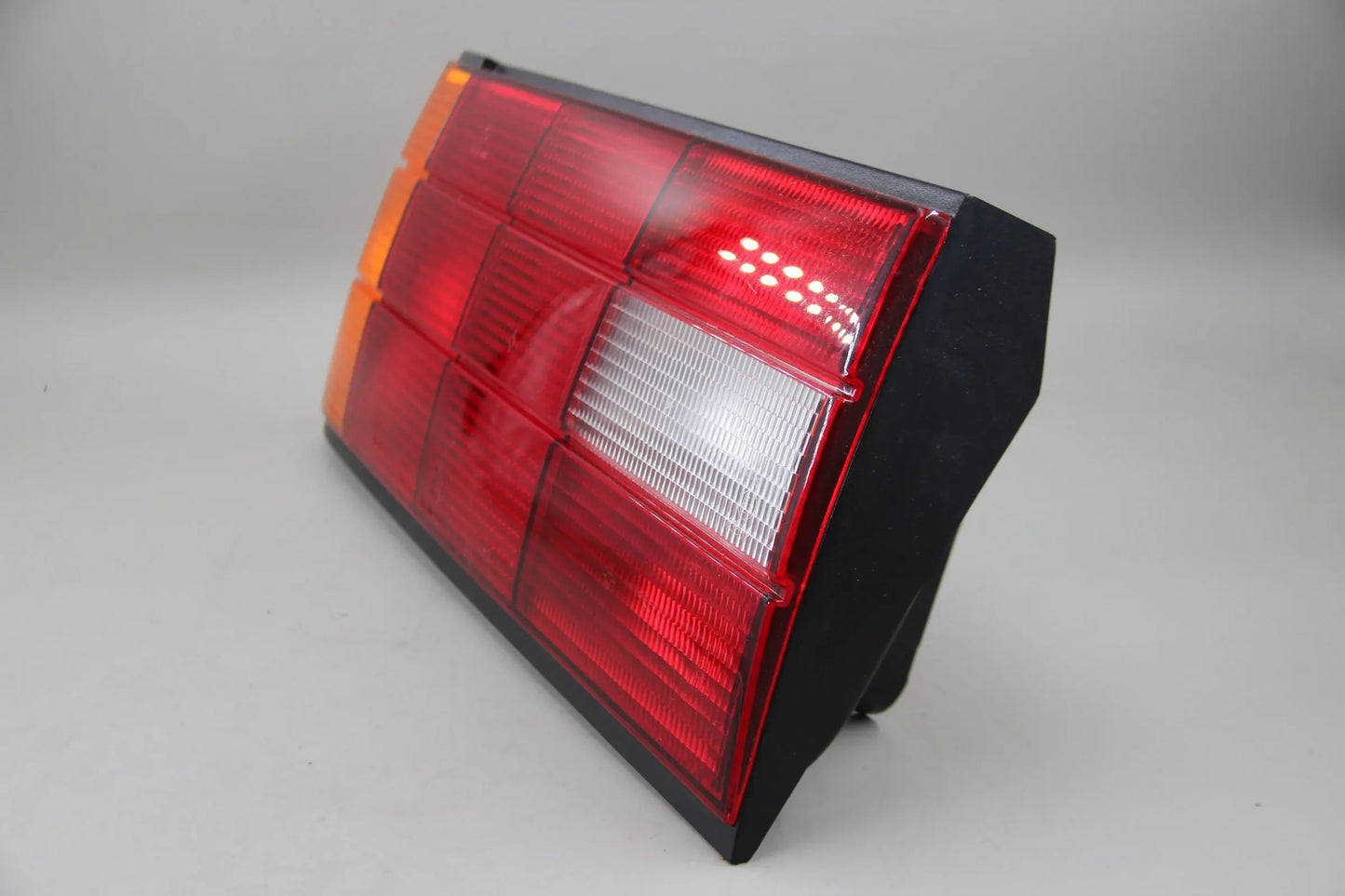 Orig. BMW E30 316i-325i Heckleuchte mit Nebelschlusslicht links NOS 63211386941