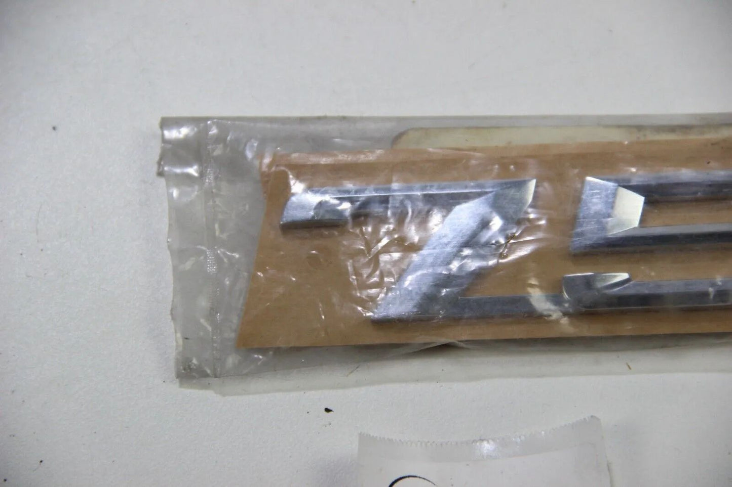 NEU BMW Original E32 E38 Emblem "750" 51148136272 Modellbezeichnung Badge V12